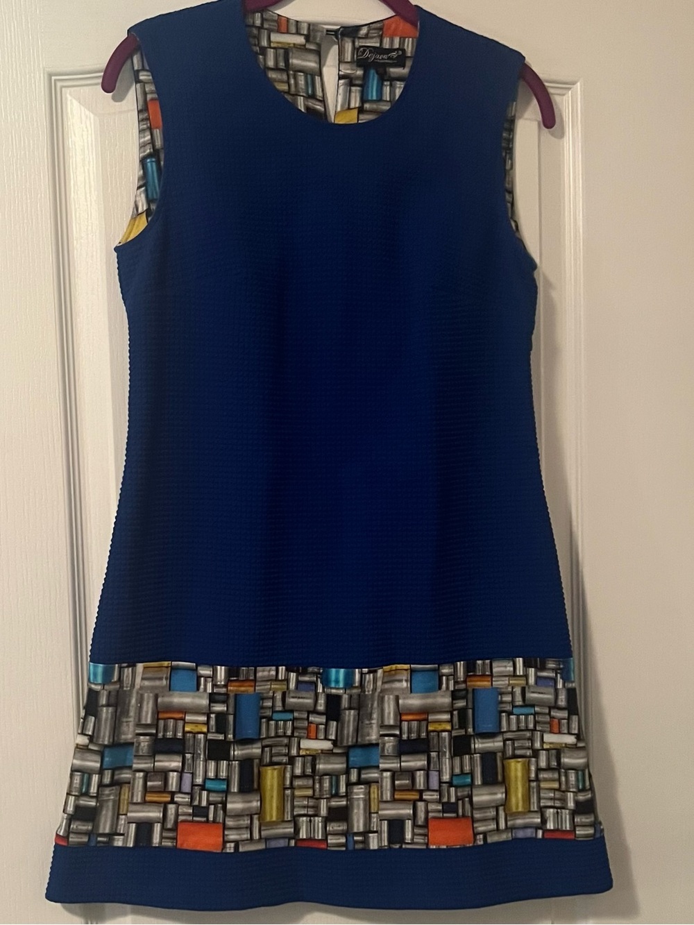 Sleeveless Cobalt Shift Dress with Geometric Hem